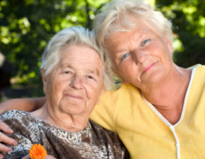 Mother and her dughter hugging each other